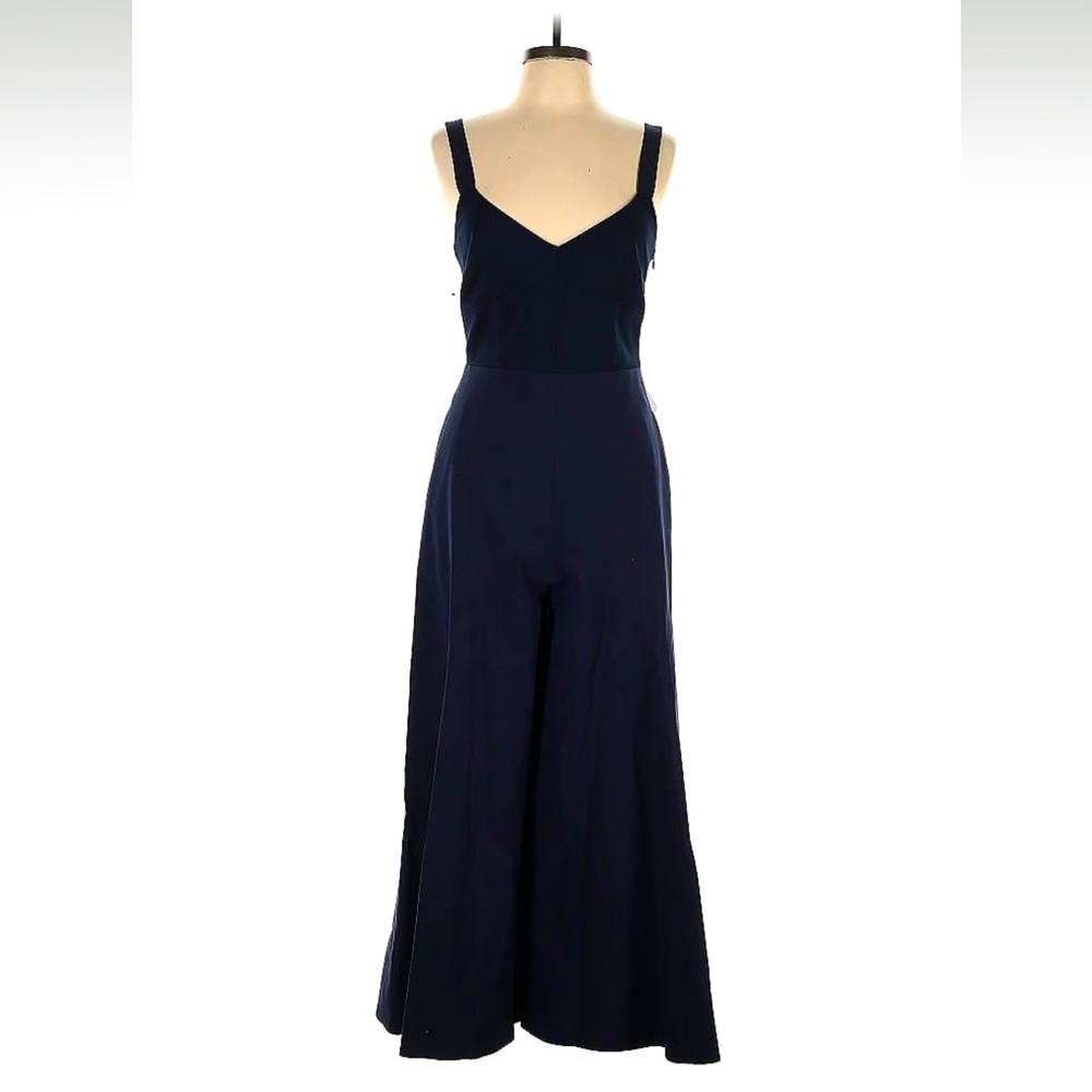 Beautiful dark blue jumpsuit. Brand new with tags. Size 8.